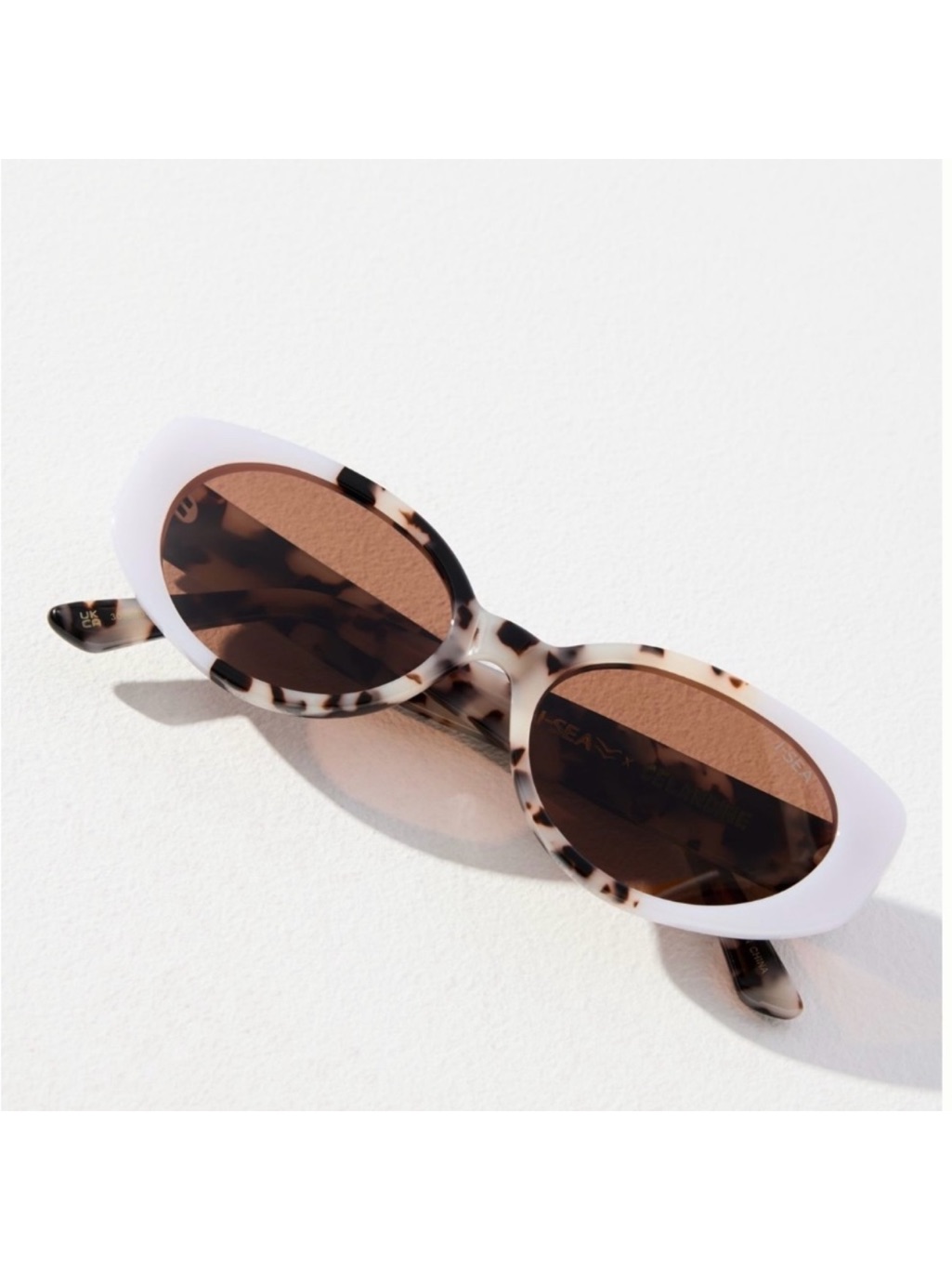 Anthropologie Tortoiseshell And White Oval Sunglasses - Brown Lenses